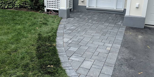 interlock pathway to side door grey brick